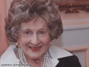 Letitia Baldrige says there are polite ways to greet people without spreading illness.