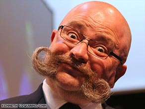 Dan Sederowsky of Sweden shows off his moustache in Anchorage.