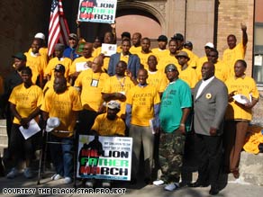 Men participate in the Million Father March to support children going to school.