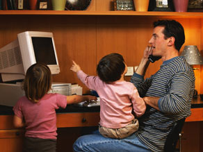 Many people in the corporate world still aren't sympathetic to parents, particularly dads, author says.