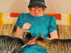 Two cats are OK, says writer, but having more may move you into questionable territory.