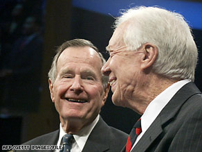 Former Presidents George H.W. Bush, left, and Jimmy Carter can smile now about their performance in polls.