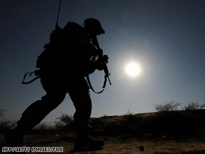 A U.S. soldier patrols in a village north of Kabul, Afghanistan, last month.