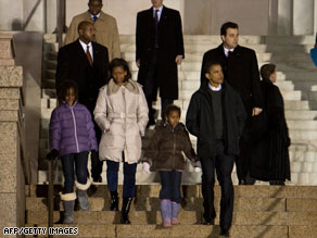 The Obama family walks down the steps of the Lincoln Memorial in Washington on Saturday.