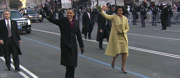 Cheers greet Obamas on parade route