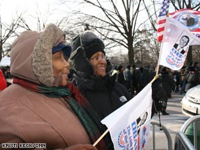 Margret Forsythe, left, and Evadey Minott came to Tuesday's inaugural events from Brooklyn, New York.