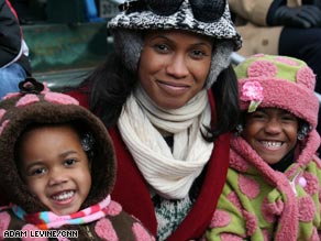 Vanessa Reed of Centerville, Virginia, took her daughters to a spot on the inaugural parade route.