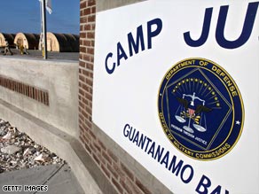 Prosecutions have been halted at Guantanamo Bay's Camp Justice after an order by President Obama.