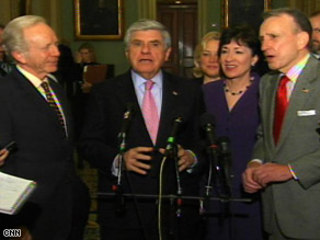 Sen. Ben Nelson (D-Nebraska) and other senators taking part in negotations address the media Friday.