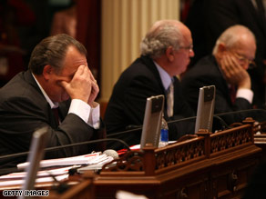 California state senators struggle through a long budget negotiation session Tuesday.
