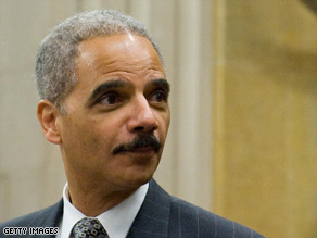 Attorney General Eric Holder helps celebrate Black History Month at an event Wednesday at the Justice Department.