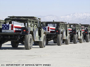A transport plane carries caskets of U.S. servicemen in this photo the Pentagon released in 2005.