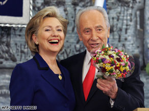 Clinton lays a wreath at the Yad Vashem memorial to Holocaust victims in Jerusalem on Tuesday.