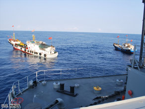 The Navy says this photo shows two Chinese trawlers forcing the Impeccable to make an emergency "all stop."