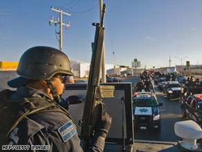 Mexican federal police patrol last week on the streets of Ciudad Juarez, just across the border from El Paso, Texas.