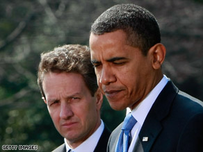 Treasury Secretary Tim Geithner, left, stands with the president at a press conference Wednesday.