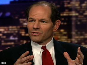 Ex-New York Gov. Eliot Spitzer says focusing on those AIG bonuses misses the bigger financial picture.