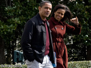 As Democratic volunteers met Saturday, President Obama and his wife, Michelle, flew to Camp David.