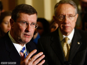 Sen. Harry Reid, right, says he expects Sen. Kent Conrad's version of the budget to pass.