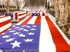 A transport plane carries caskets of U.S. servicemen in this photo the Pentagon released in 2005.