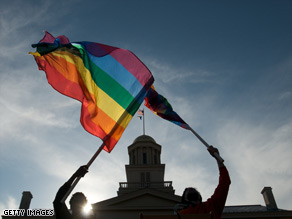 Demonstrators in Iowa celebrate that state's approval of same-sex marriage on Friday.