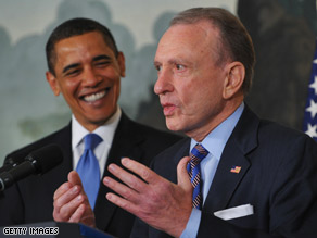 Sen. Arlen Specter speaks Wednesday as President Obama looks on in the White House