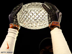 College football teams play in the BCS for the national championship trophy.