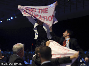 http://i2.cdn.turner.com/cnn/2009/POLITICS/05/04/israel.peres/art.protest.aipac.gi.jpg