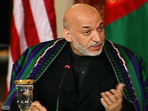 Afghan President Hamid Karzai, in Washington Wednesday, pledged to work with the United States to stabilize his country.