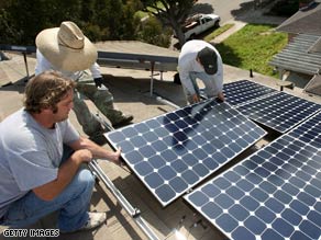 Solar electric panels likes these on a California building could soon come to schools across the country.