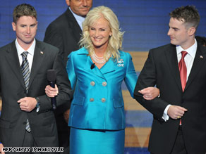Cindy McCain walks with son Jimmy, left, and Jack at the Republican National Convention.