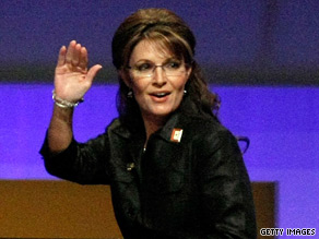 Alaska Gov. Sarah Palin waves to the crowd at the Republican fundraising dinner Monday in Washington.