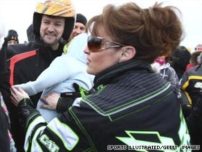 One dismissed claim cited Gov. Sarah Palin's decision to wear an Arctic Cat logo during a snowmobile race as a conflict of interest.