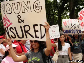 Students at a June rally for health care reform -- but a CNN poll shows people have concerns about the cost.