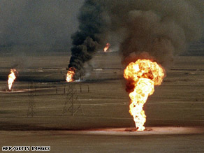 A March 1991 photo shows burning oil wells in Kuwait damaged by Iraq military forces.