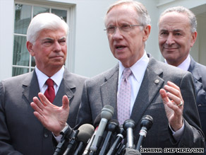 Sen. Harry Reid, center, talks about health care flanked by Sens. Christopher Dodd, left, and Charles Schumer.