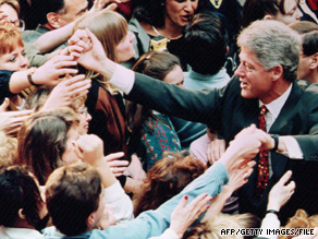 President Bill Clinton, pictured in 1994, greets members of a crowd following a speech on his health care reform plan.
