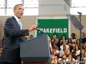 Education Secretary Arne Duncan, second from right, listens to Obama's speech Tuesday.