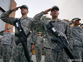 U.S. troops participate in a ceremony commemorating the eighth anniversary of 9/11 in Bagram, Afghanistan.