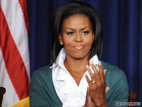 First lady Michelle Obama listens to remarks during a health care forum at the White House on Friday.