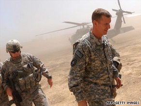 Gen. Stanley McChrystal, right, arrives at a U.S. base in Logar Province, Afghanistan, last month.