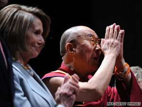 The Dalai Lama sits with House Speaker Nancy Pelosi at the awards ceremony on Tuesday.