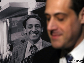 Stuart Milk, nephew of Harvey Milk, sits next to a photo of the gay rights activist in March.