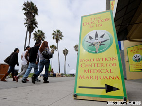 Signs beckon patients into a medical marijuana clinic in Los Angeles, California.