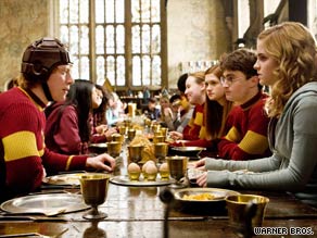 Ron (Rupert Grint, left), Harry (Daniel Radcliffe, second from right) and Hermione (Emma Watson) in the new film.
