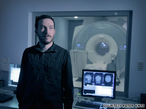 A researcher at Mindsign Neuromarketing gets the test subject ready for the experiment.