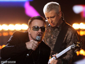 Bono, left,  and Adam Clayton perform at a recent awards show. U2 has been together for 30 years.