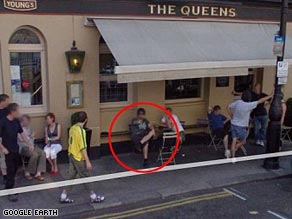 Liam Gallagher says the figure captured on Google Earth outside a pub in London is not him.