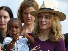 Madonna holds her adopted Malawian son, David Banda, in 2007.