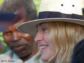 Madonna arrives in Lilongwe in Malawi, where she hopes to adopt a second child.